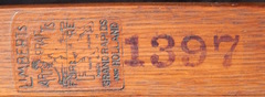 Close up image branded Limbert signature and stenciled catalogue number 1397.